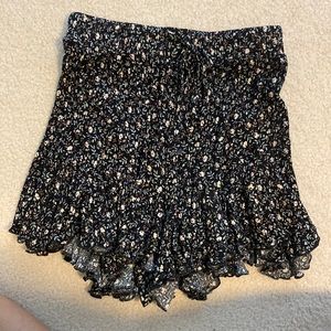 Women’s multi-colored dressy shorts in size small by Maple.